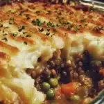 Festive Vegan Lentil Shepherd’s Pie topped with fluffy mashed potatoes